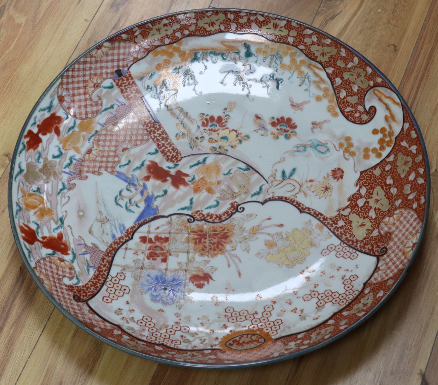 A large Kutani charger, Edo period, diameter 56cm